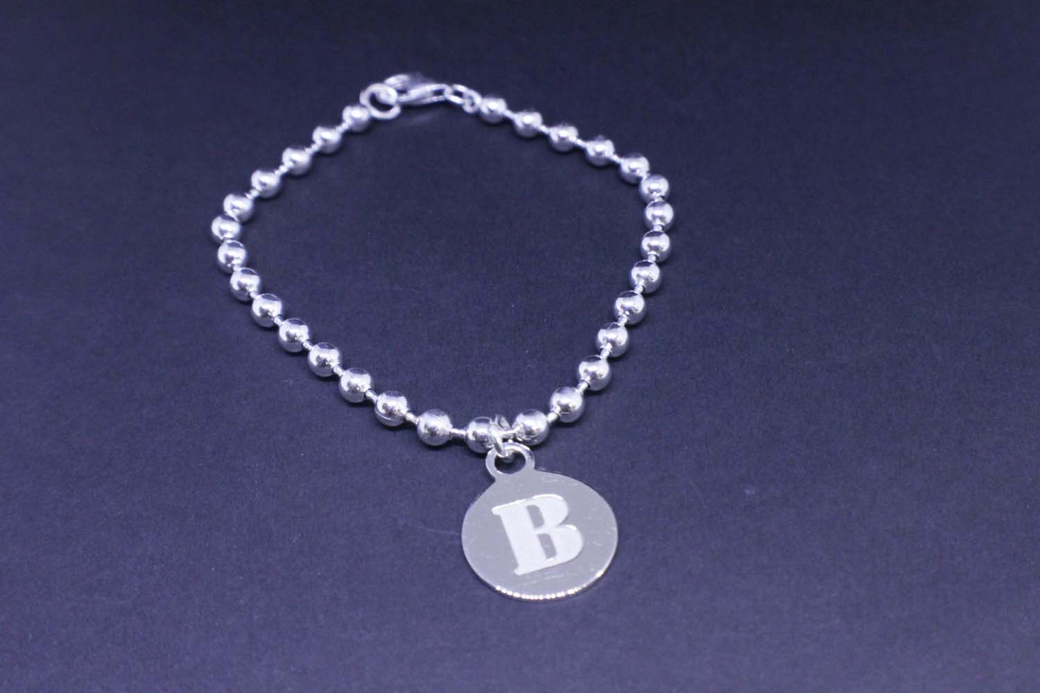 Silver bead bracelet with sphere 4mm with medal Logo collection