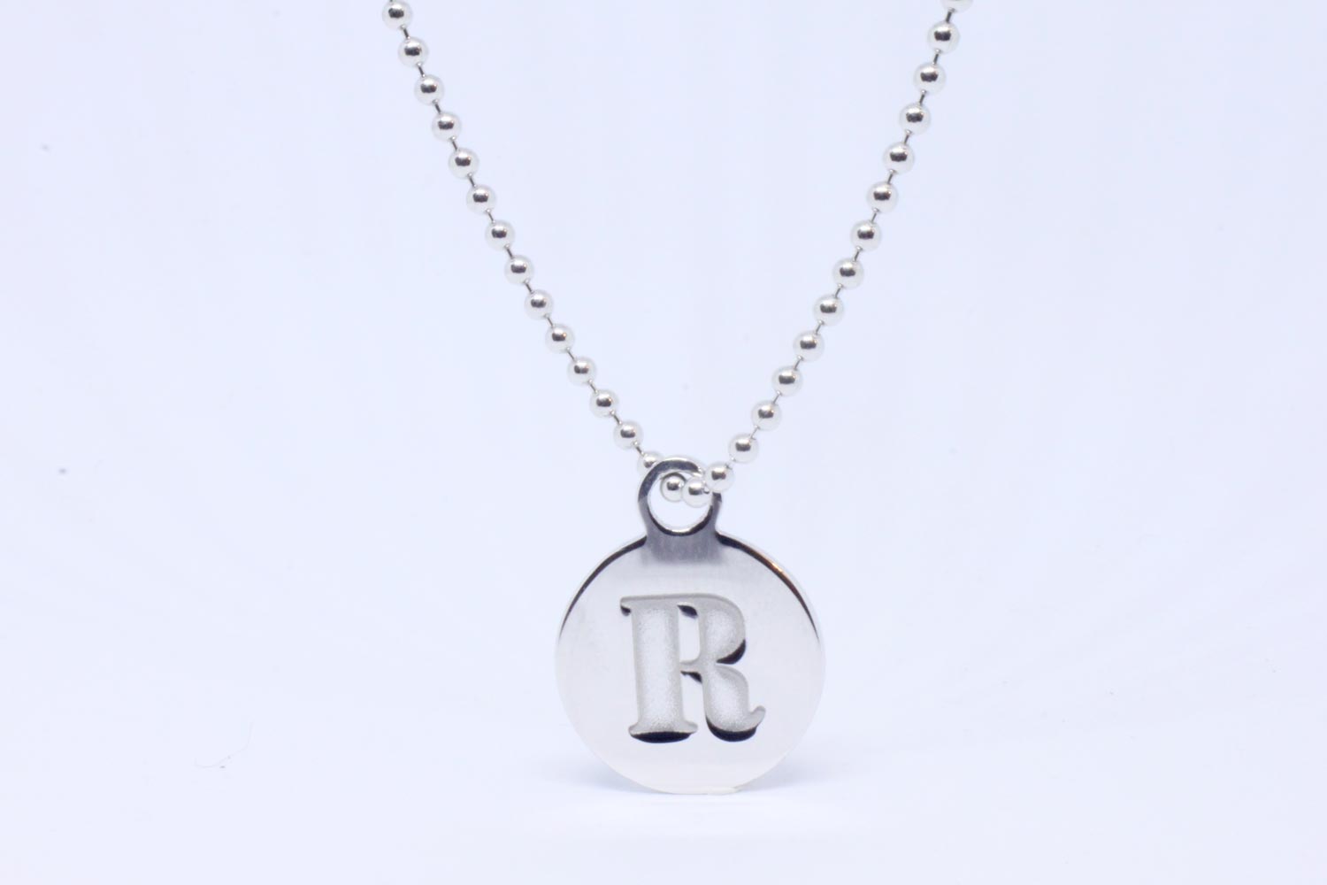 Silver long necklace with medal Logo collection