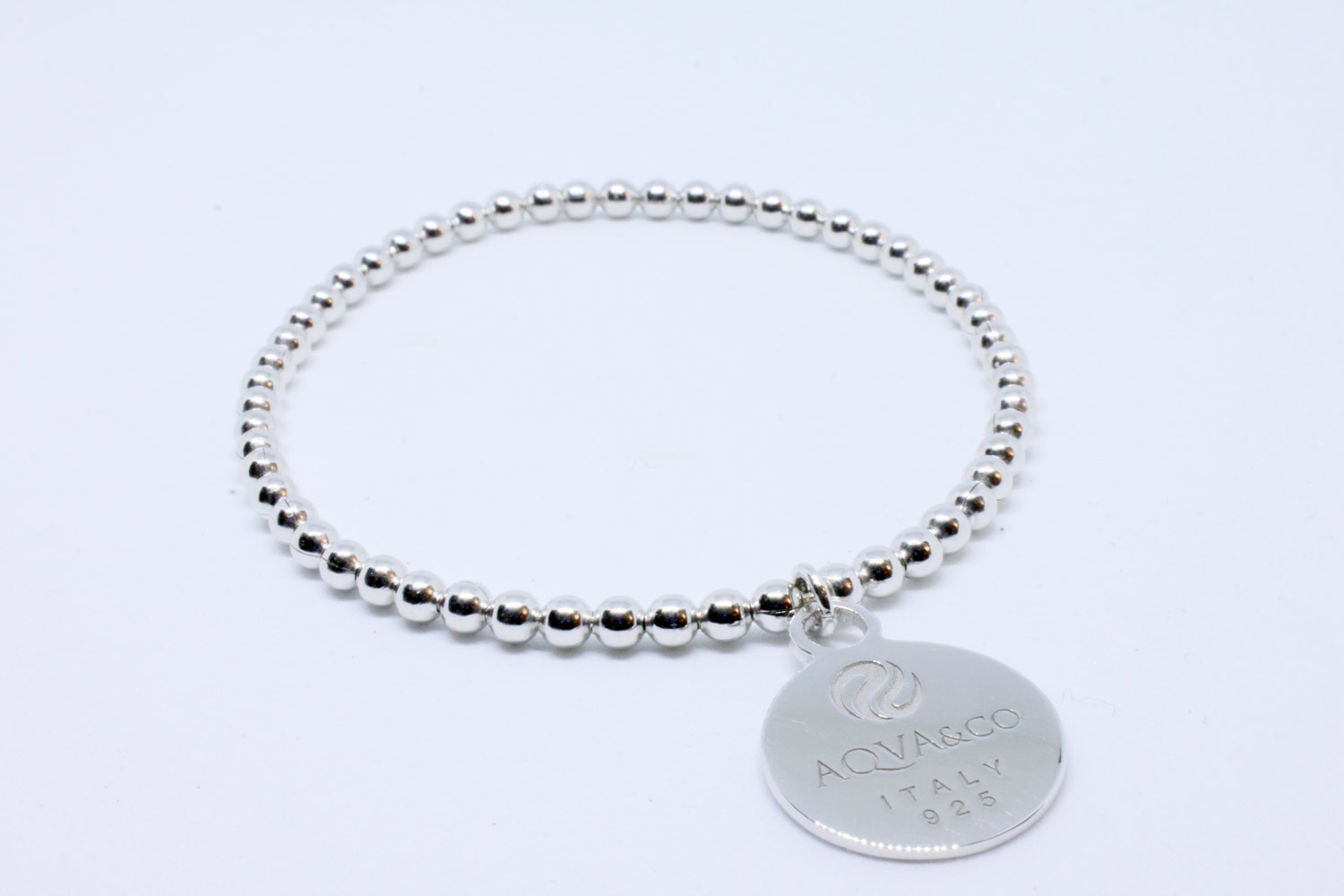 Silver elastic bead bracelet with initial medal Logo collection